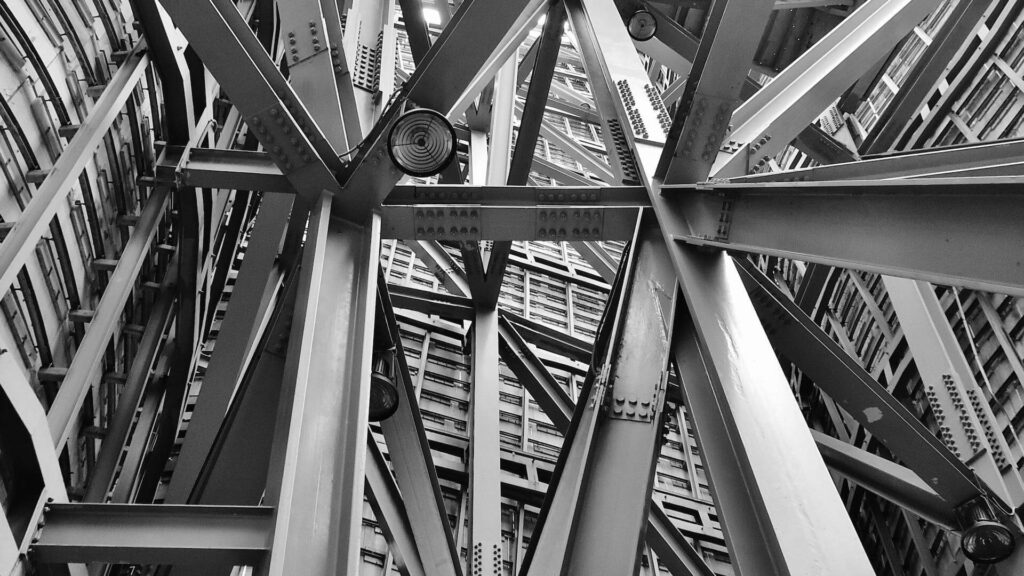 Grayscale photography of scafoldings